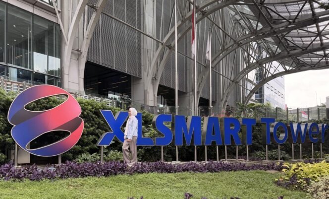 
					XLSMART raih Rating 2 dari Sustainable Fitch. Validasi independen atas integrasi ESG dan efisiensi energi pasca merger untuk nilai jangka panjang. Foto/XLSMART