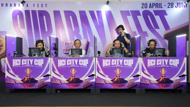 
					Suasana pertandingan Domino HGI City Cup 2026 di Grand City Surabaya saat para pemain bersaing memperebutkan poin tertinggi pada pekan kedua turnamen domino digital yang digelar oleh Higgs Games Island (HGI).